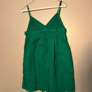 Strappy green cover-up for after the pool or maybe another event for a sundress.